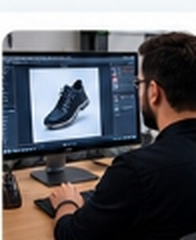 Dedicated Photo Retoucher at Workstation